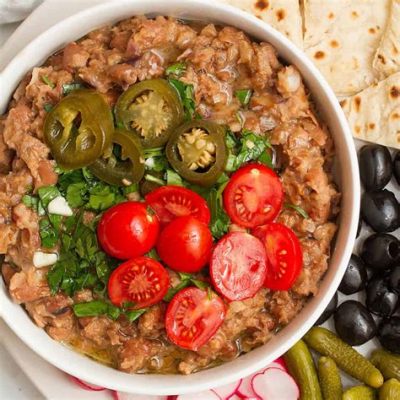  Ful Medames: A Flavorful Symphony of Earthy Beans and Tangy Spices That Will Ignite Your Taste Buds!